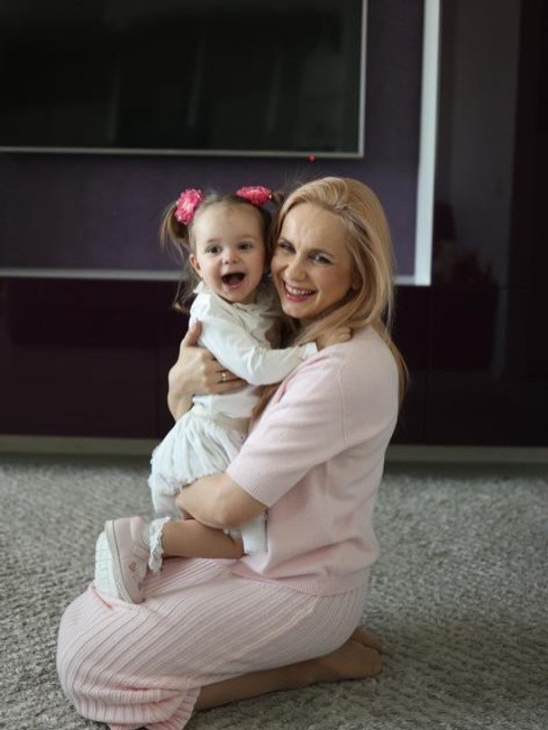 Lilia Rebrik hugs her daughter