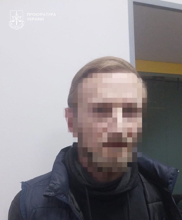 Экстрадированный херсонец в наручниках