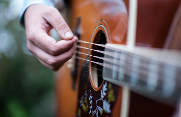 The Hidden Formula of Hit Songs: Symmetry and Algebra in Popular Melodies
