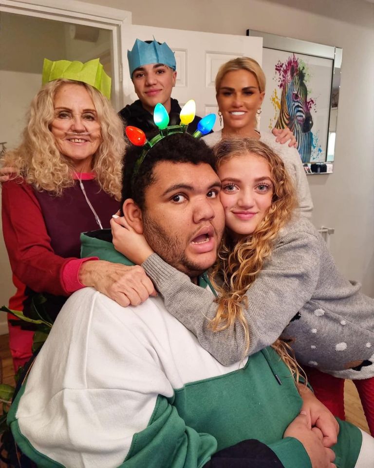Katie Price and Peter Andre with their kids at an event.