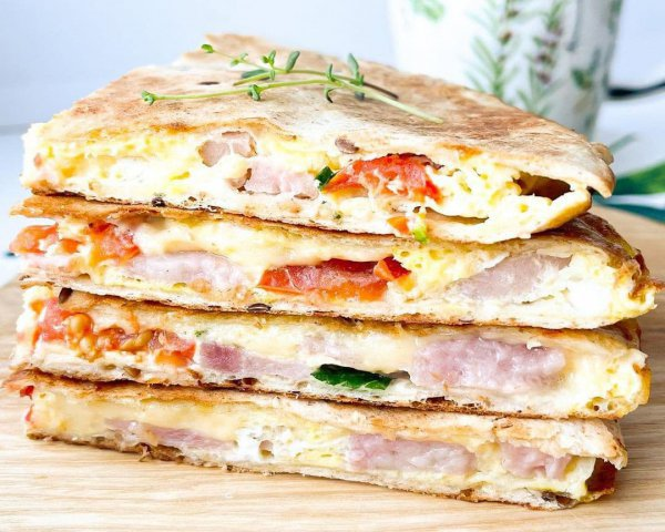 Lavash on a plate with delicious breakfast ingredients