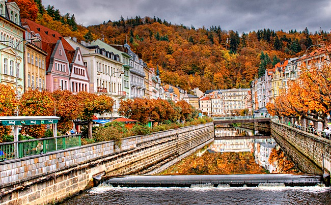 Autumn landscape of Europe with tourists