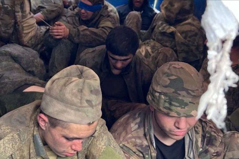 Prisoners of war passing through prison in Sumy