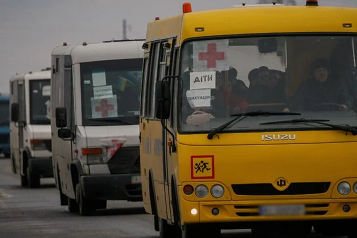 Children in evacuation bus