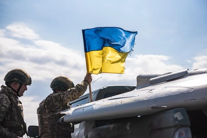 Ukrainian soldier takes cover on the frontline