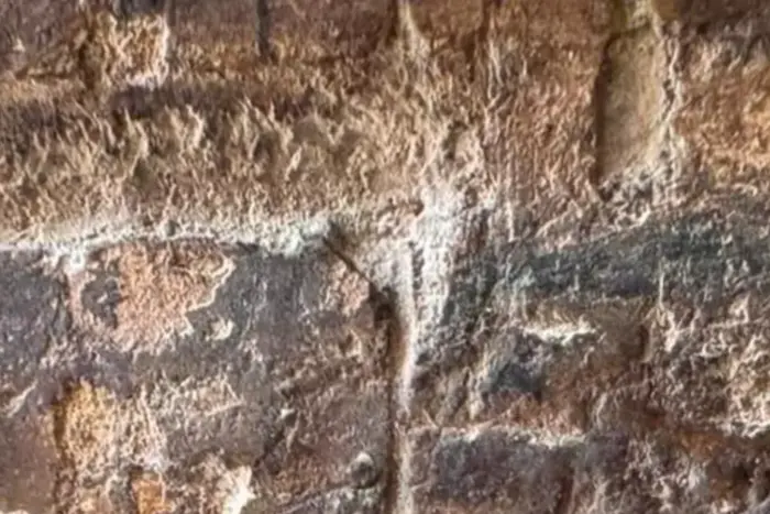 Ukrainian with initials on the Colosseum wall