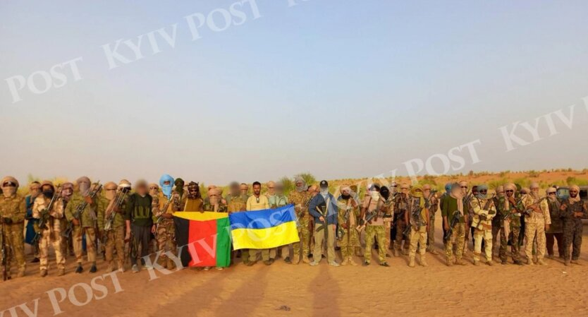 Group photo with Ukrainian flag